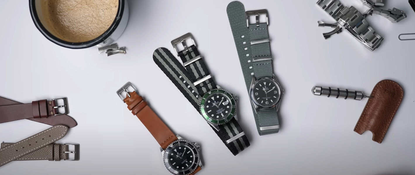 a flatlay of 3 different watches 